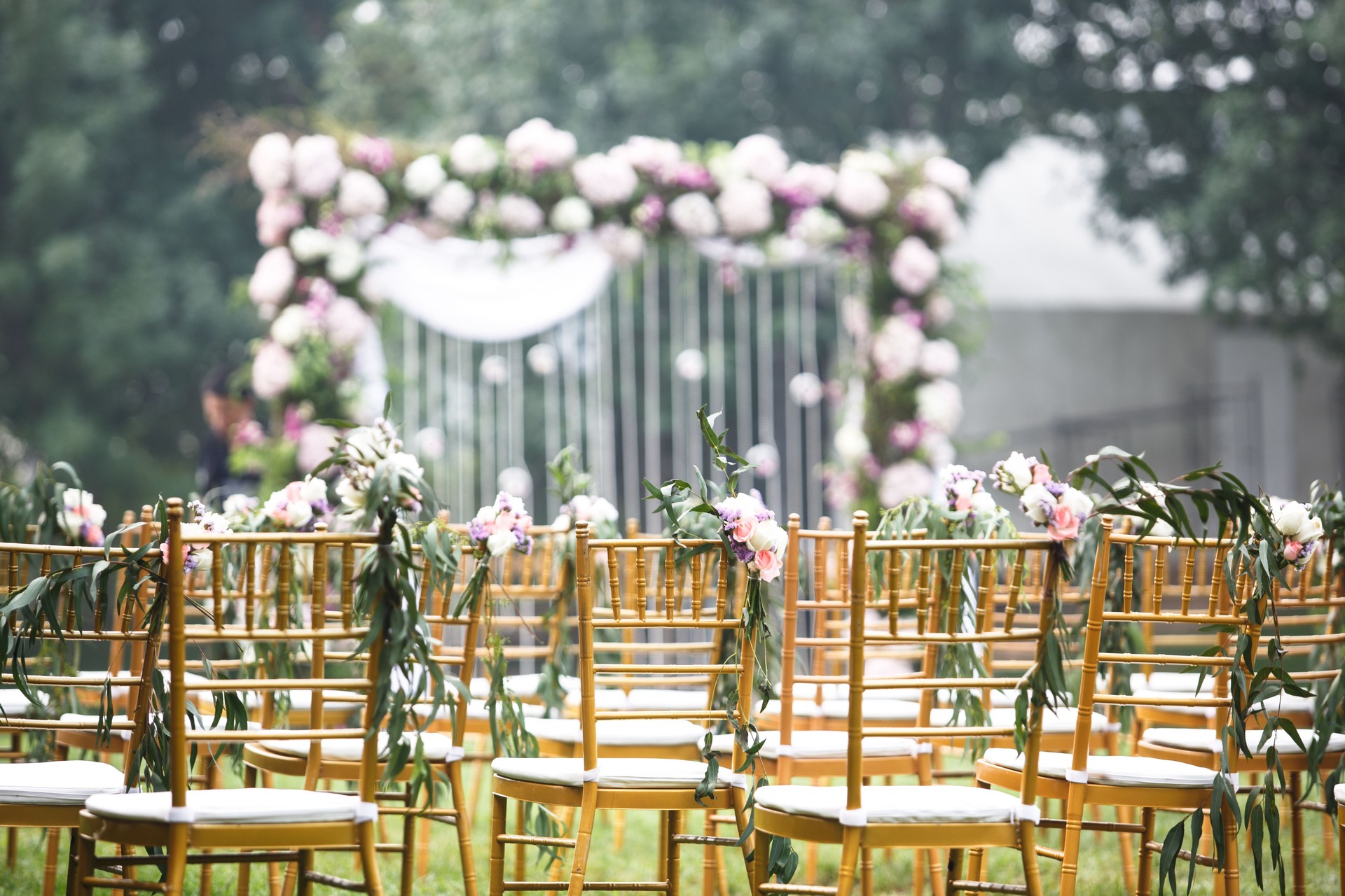 Flower decoration and wedding ceremony on green lawn Flower decoration and wedding ceremony on green lawn